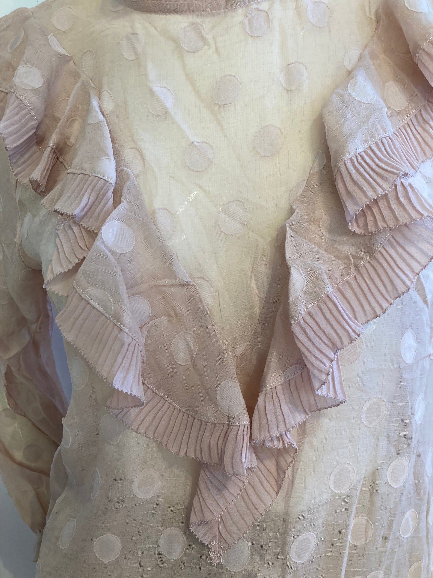 Pink blouse with flounce and peter pan collar