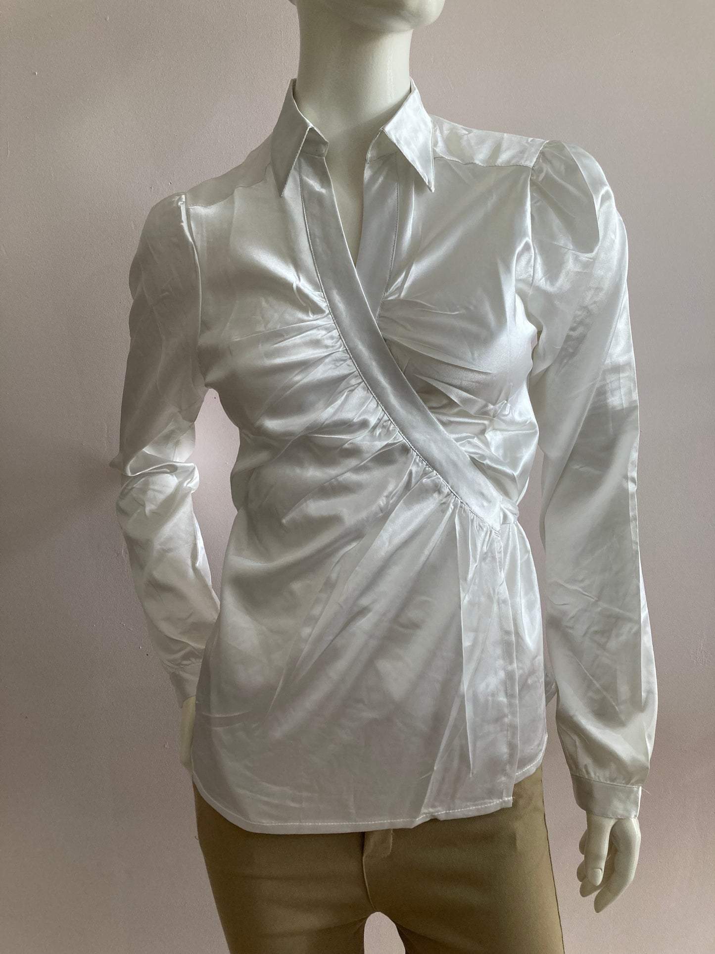 White satin wrap-style blouse