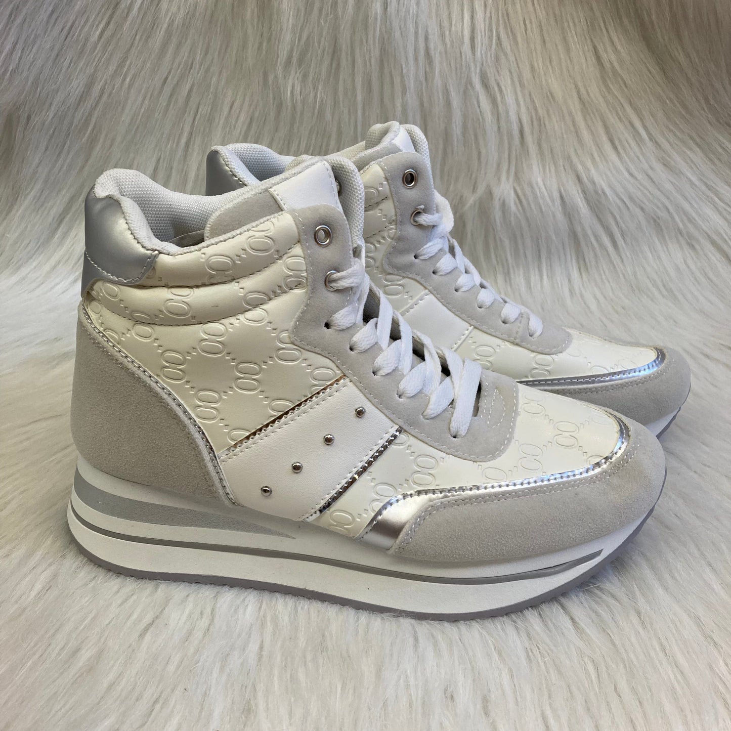 White wedge high-top trainer with pattern inspired