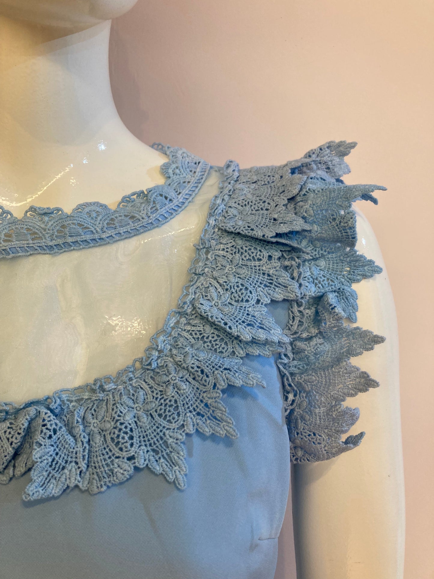 Blue dress with chiffon and lace at bust and collar.