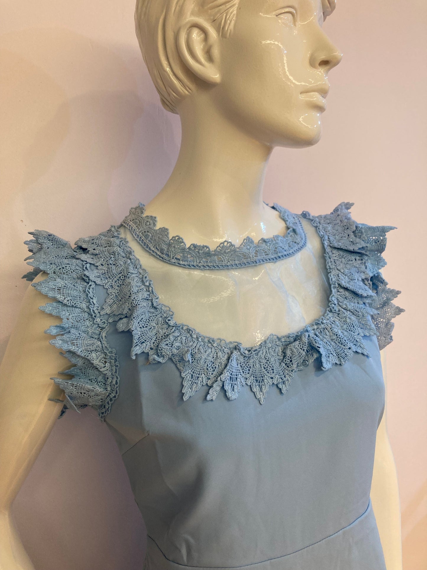 Blue dress with chiffon and lace at bust and collar.