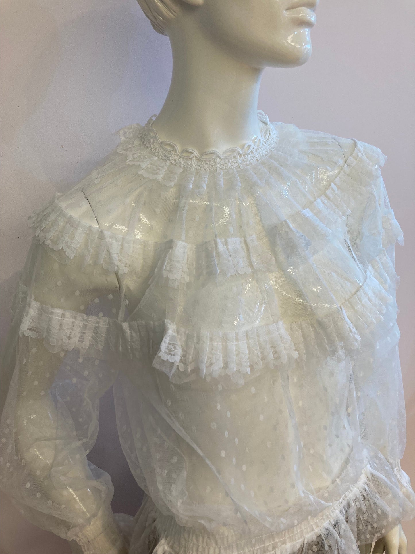 White blouse with plumetis tulle and ruffled