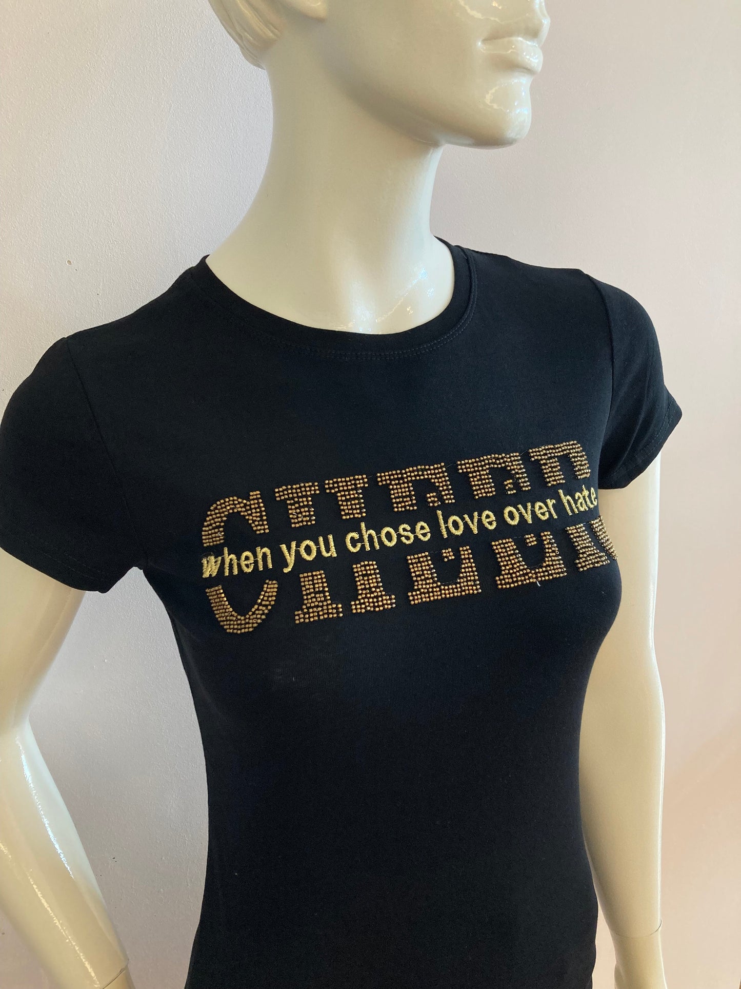 Black t-shirt with golden writing