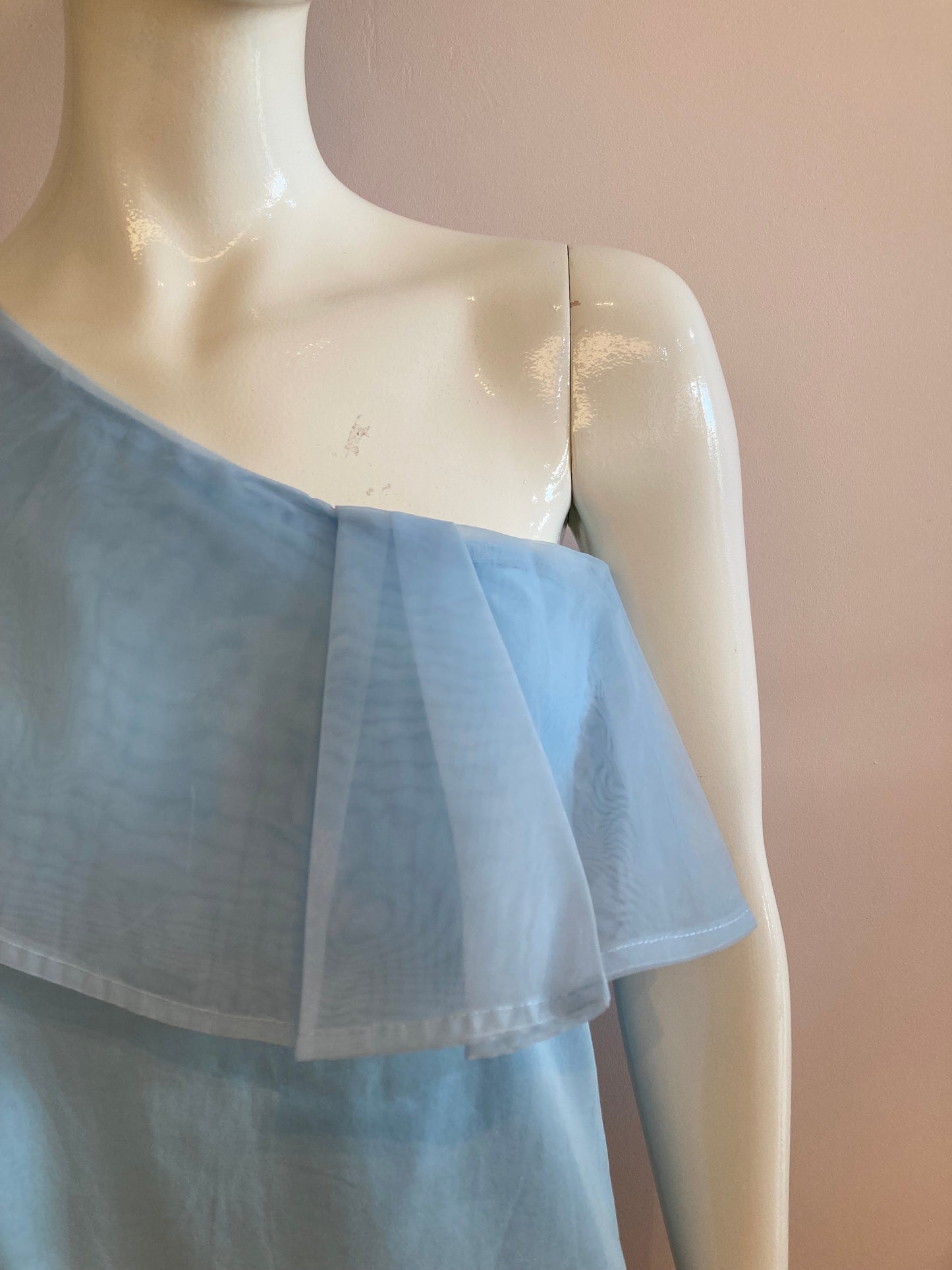 Crossover top with ruffle in turquoise