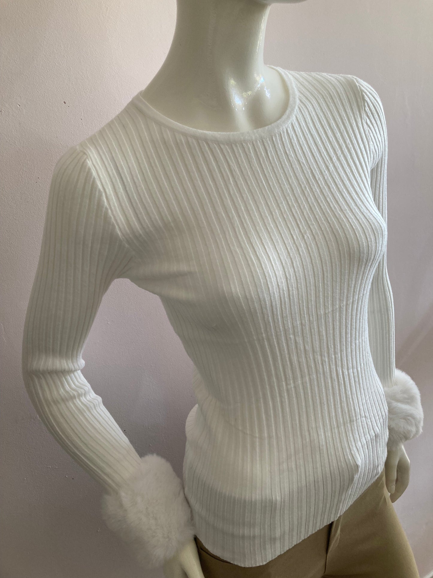 Ribbed sweater with faux fur sleeves