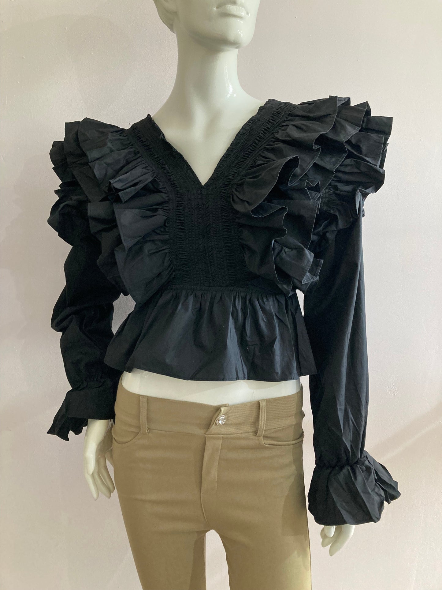 Black frilly blouse