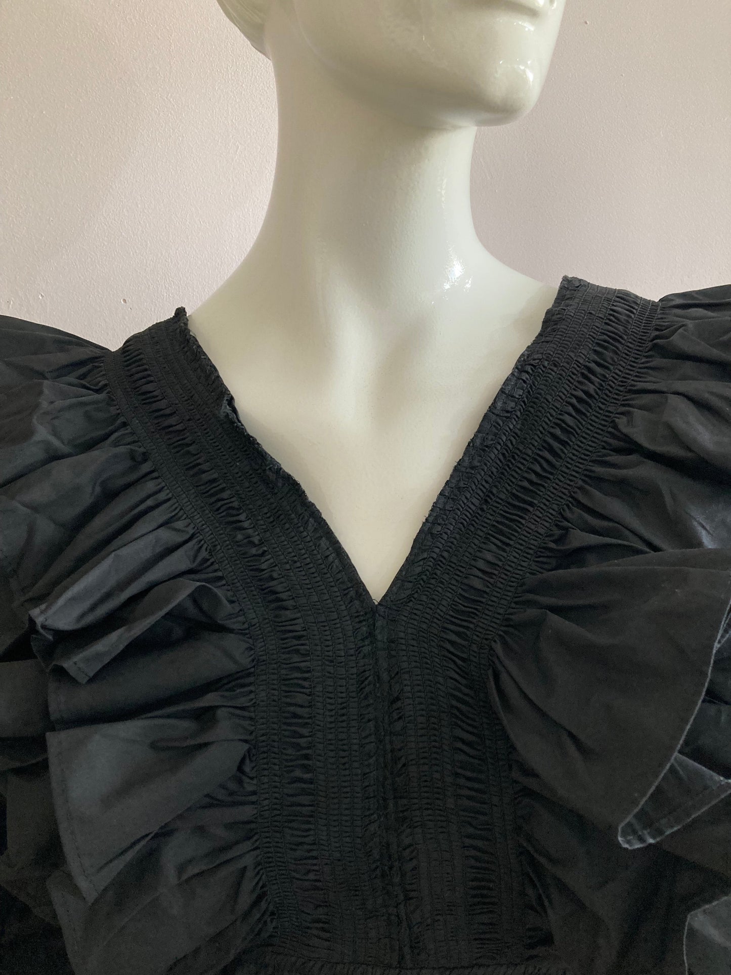 Black frilly blouse