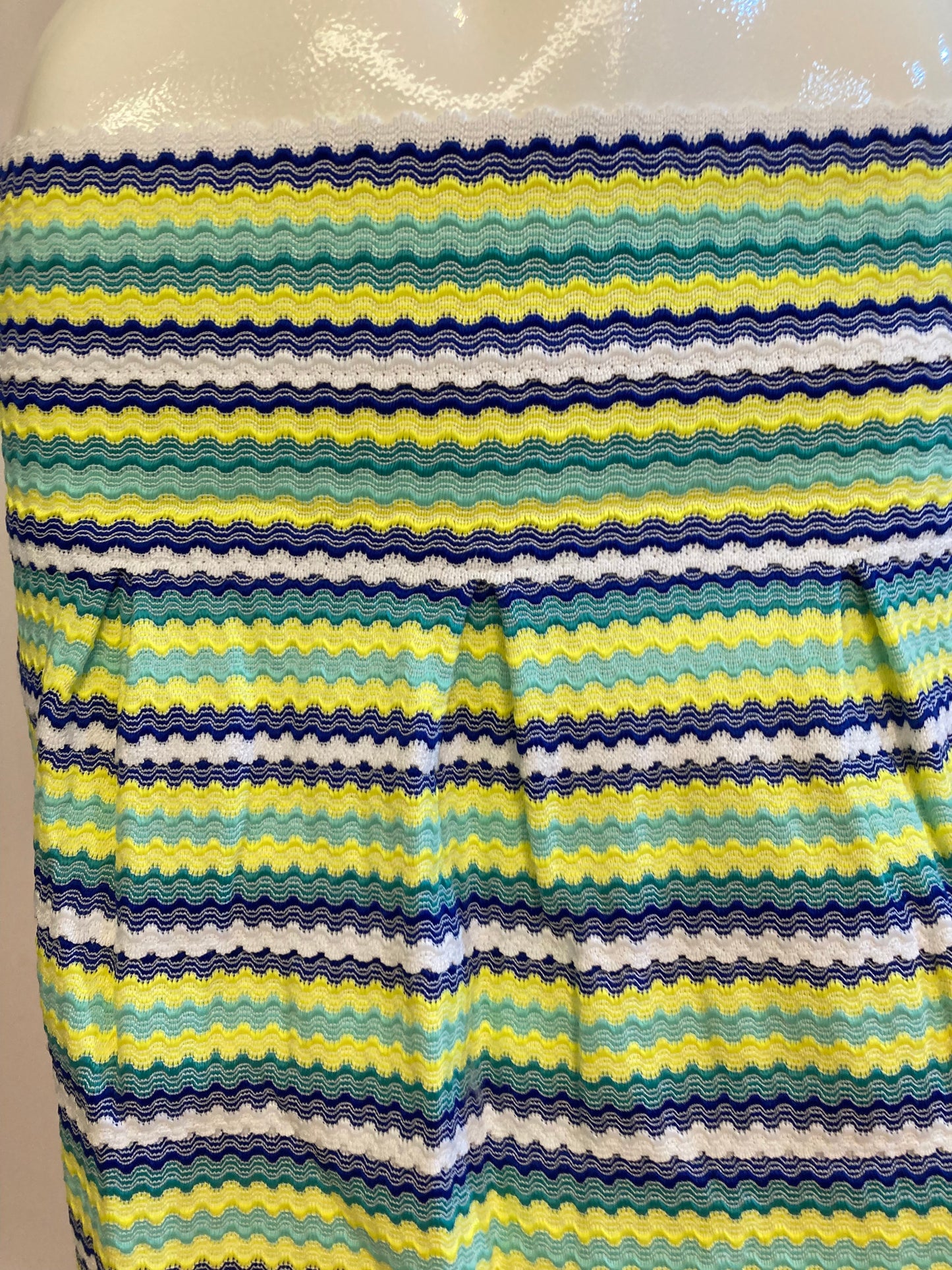 Green striped skirt with pleats and back closure