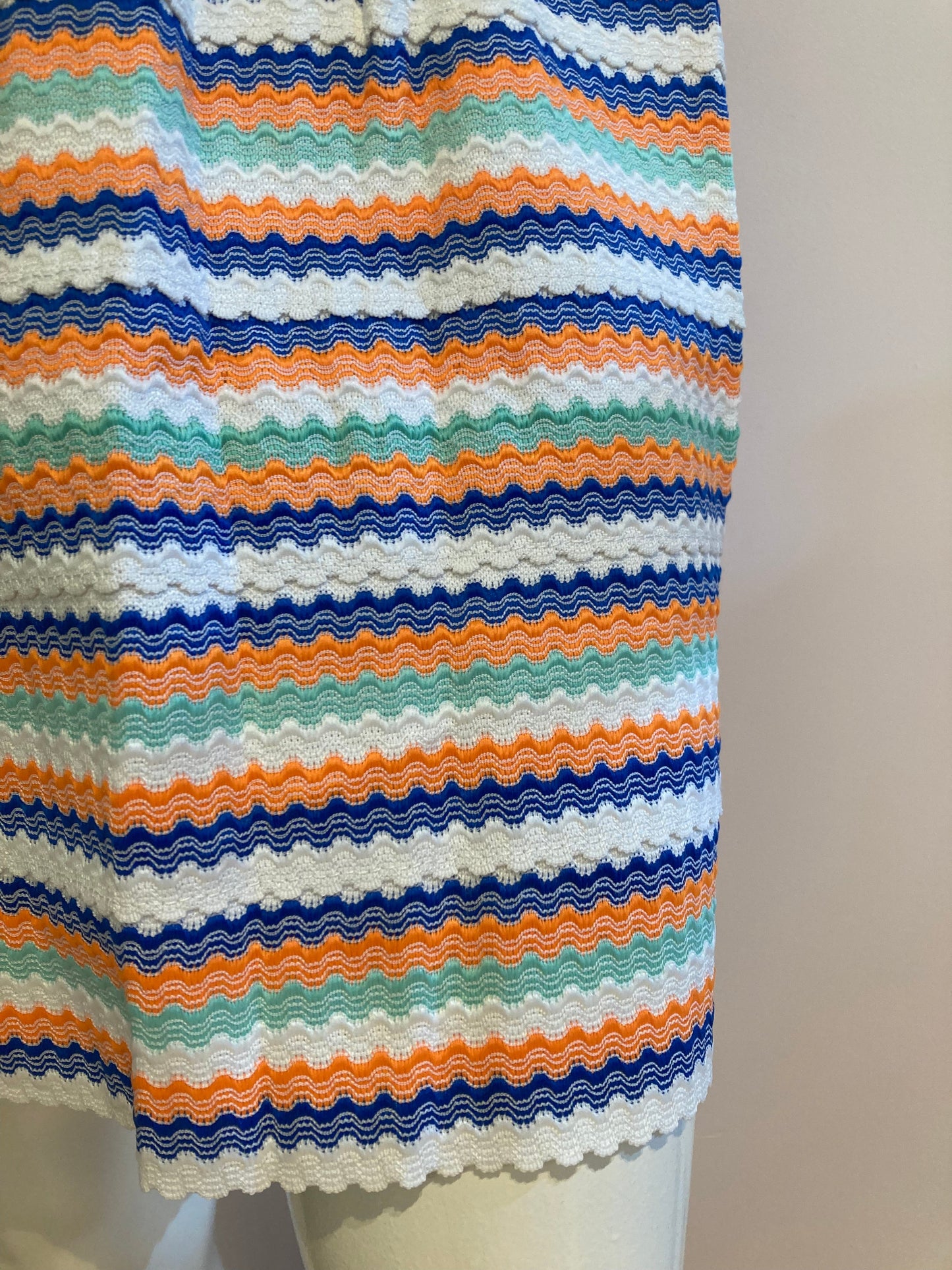 Orange striped skirt with pleats and back closure