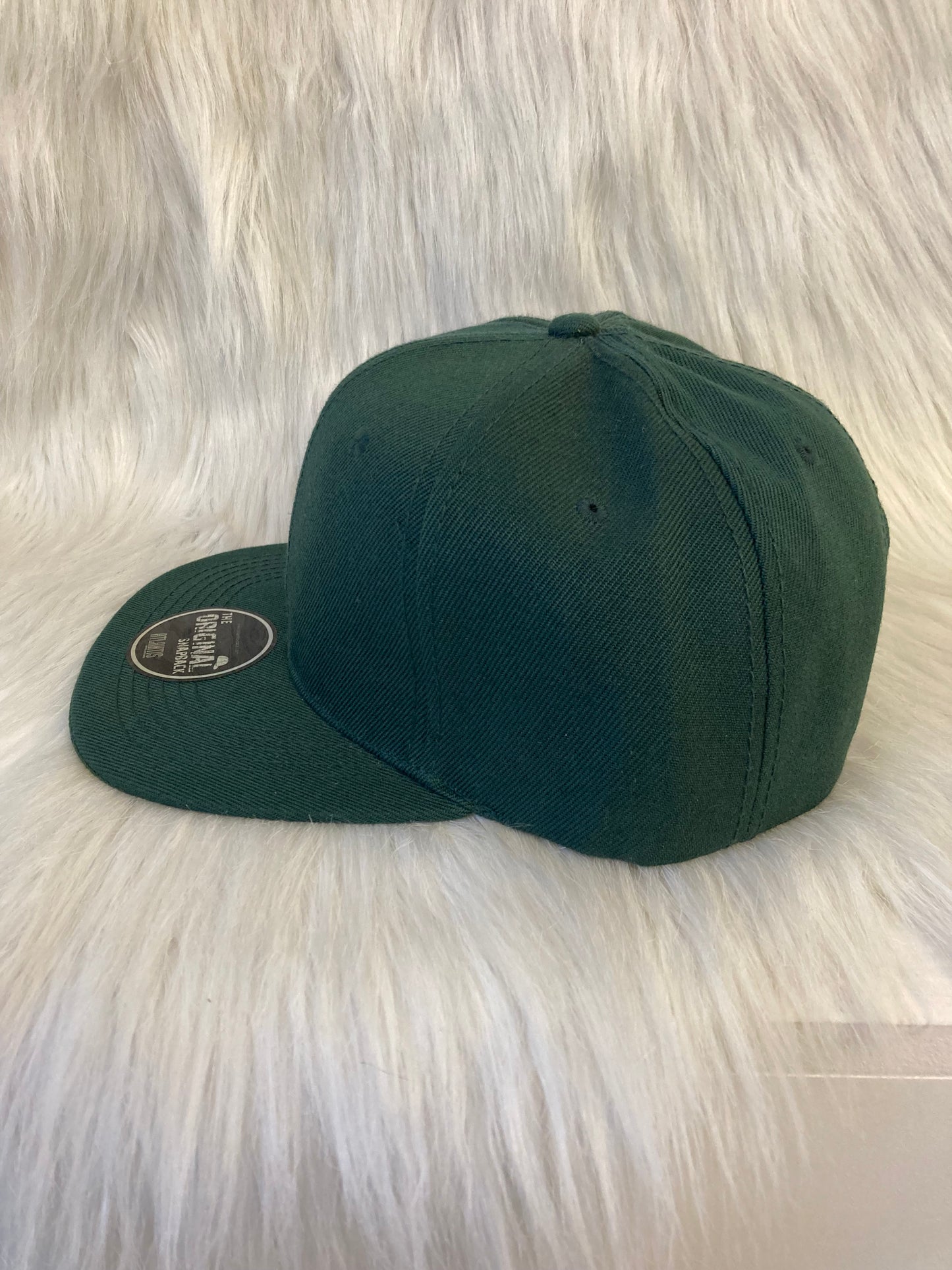 Snapback cap donkergroen