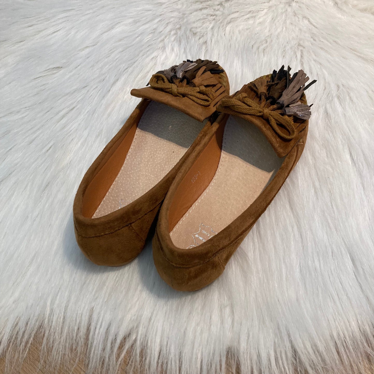 Moccasins met floshkes