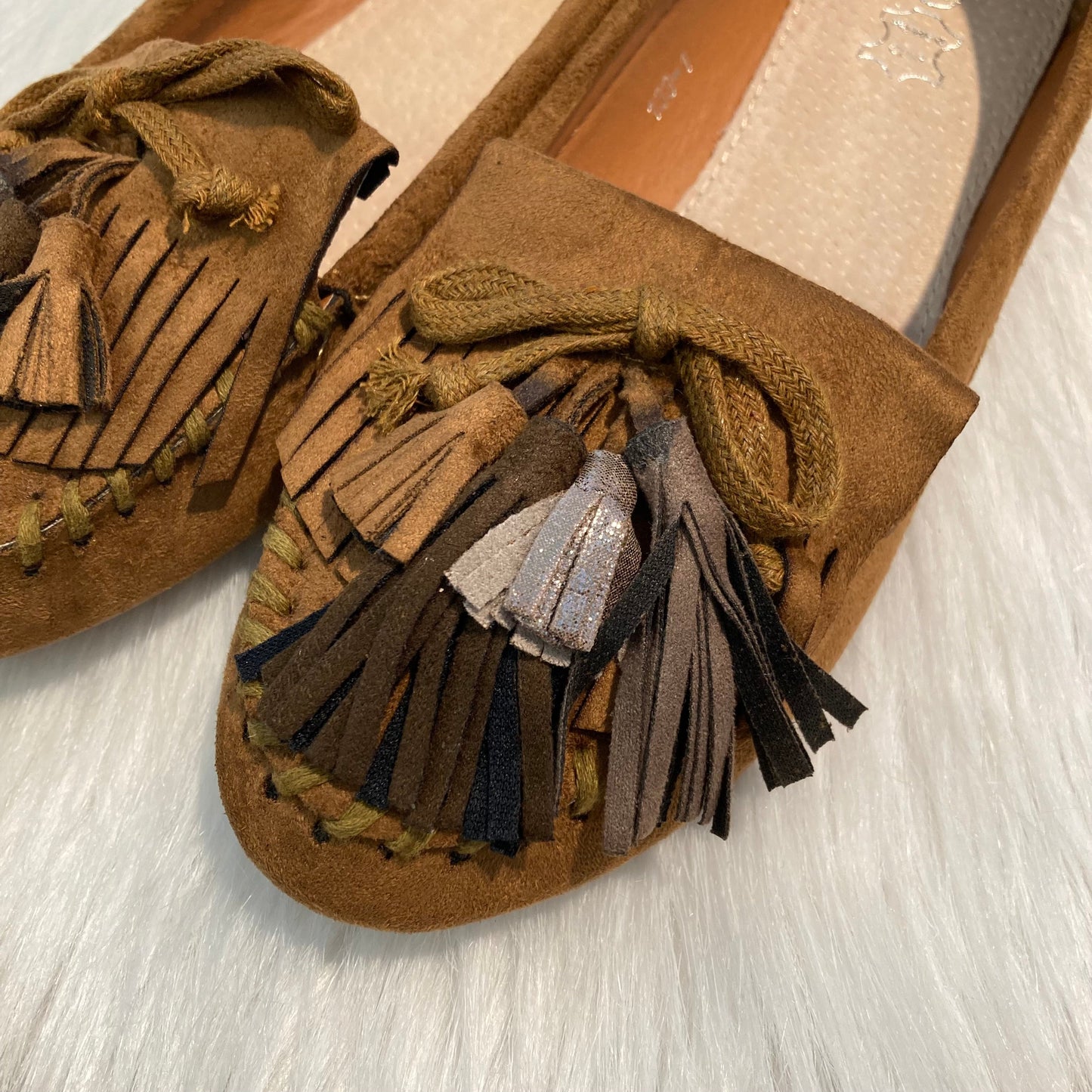 Moccasins met floshkes