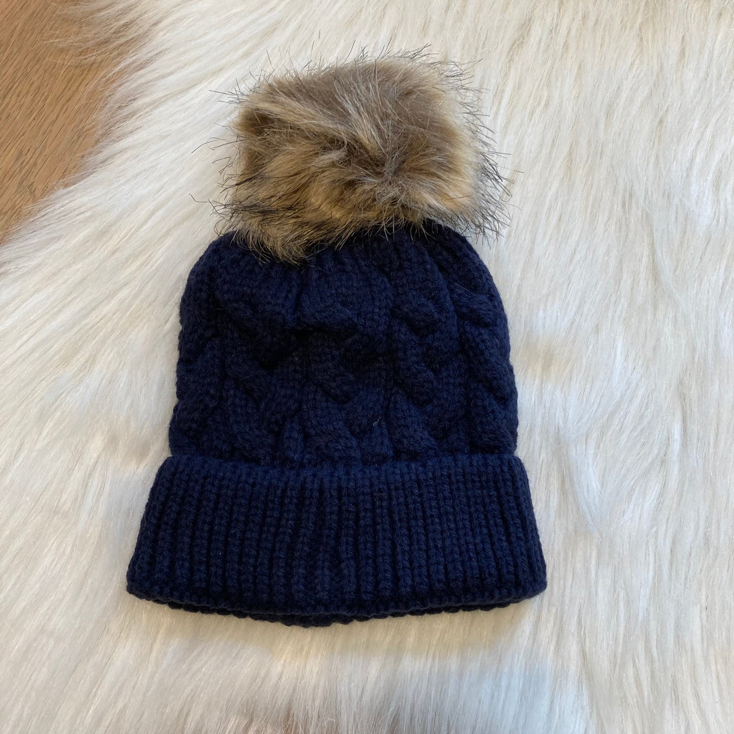 Casual babymuts marine blauw enkele pompom