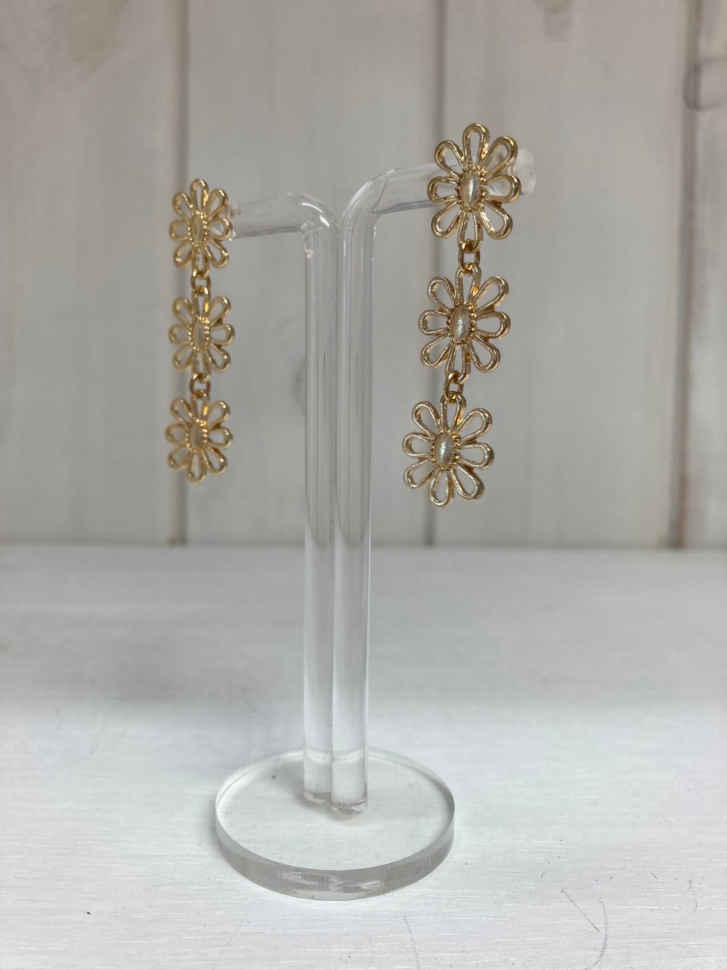 Oorhanger 3 fijne bloemen goud