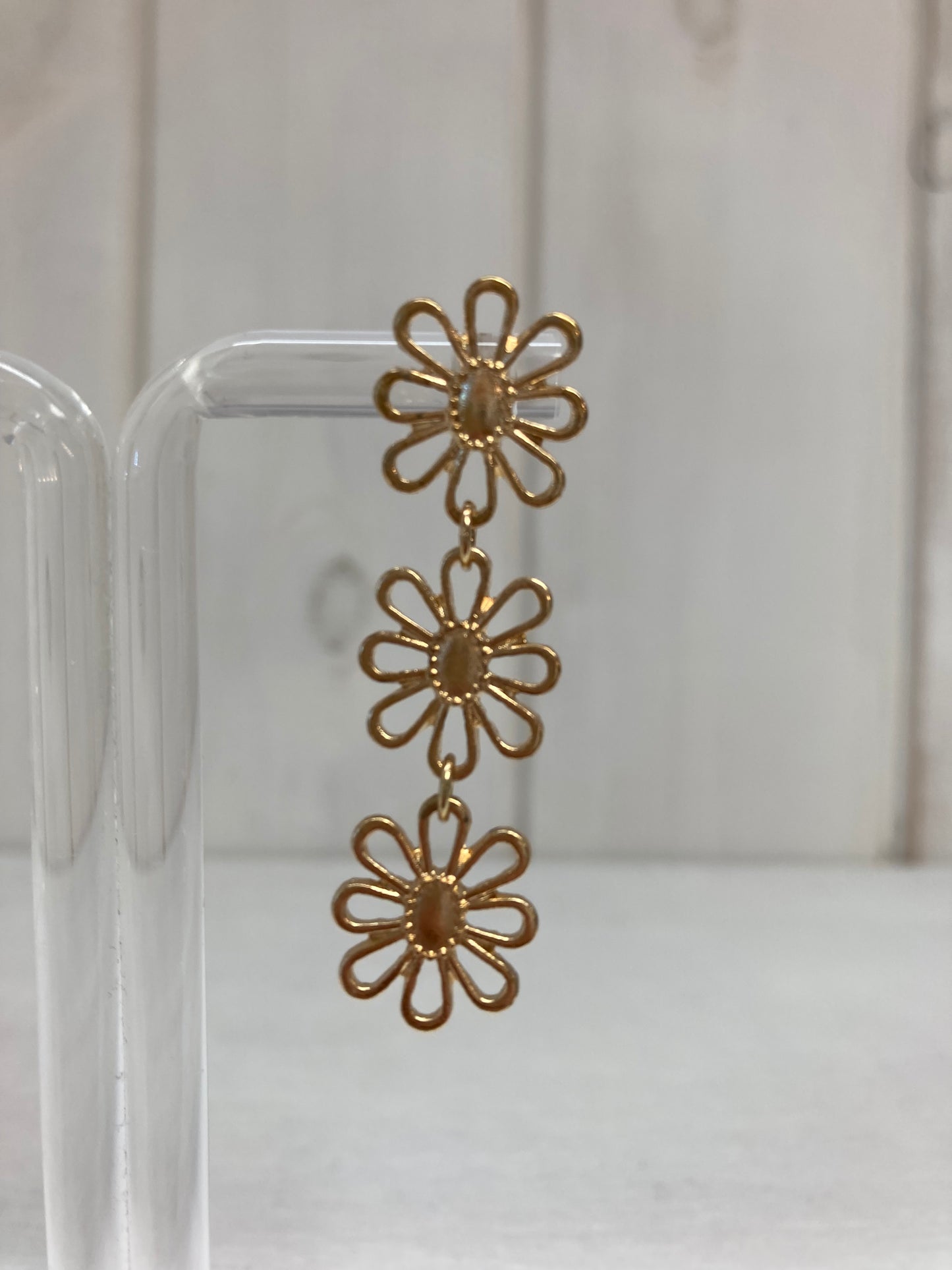 Oorhanger 3 fijne bloemen goud