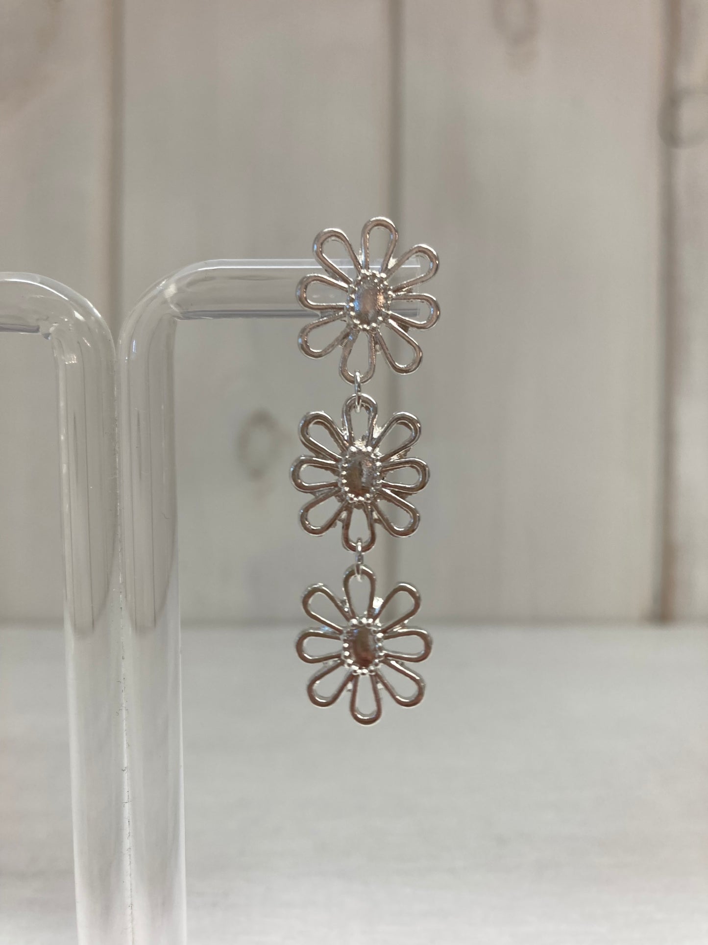 Oorhanger 3 fijne bloemen zilver